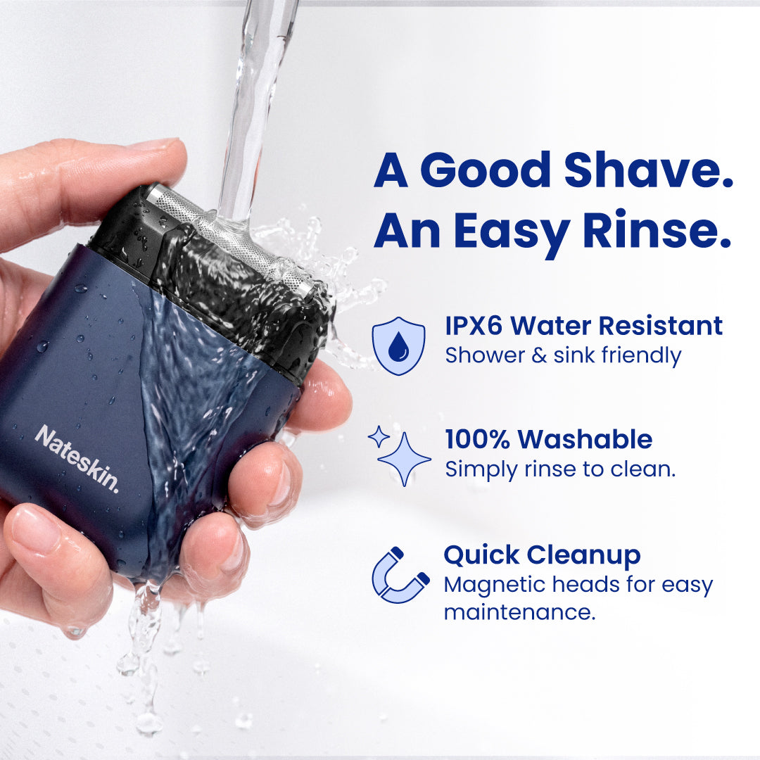 A hand holds a navy blue Nateskin electric shaver under running water, with text on the right highlighting IPX6 water resistance, washability, and quick cleanup.