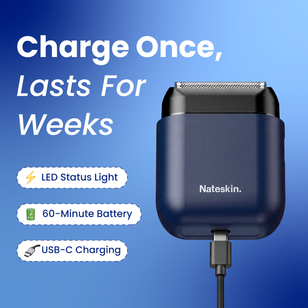 Nateskin electric shaver in a dark navy blue protective case, shown with a USB-C cable plugged in against a blue gradient background. The image includes marketing text highlighting features like LED status light, 60-minute battery, and USB-C charging.
